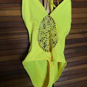 Bright yellow crochet one-piece swimsuit